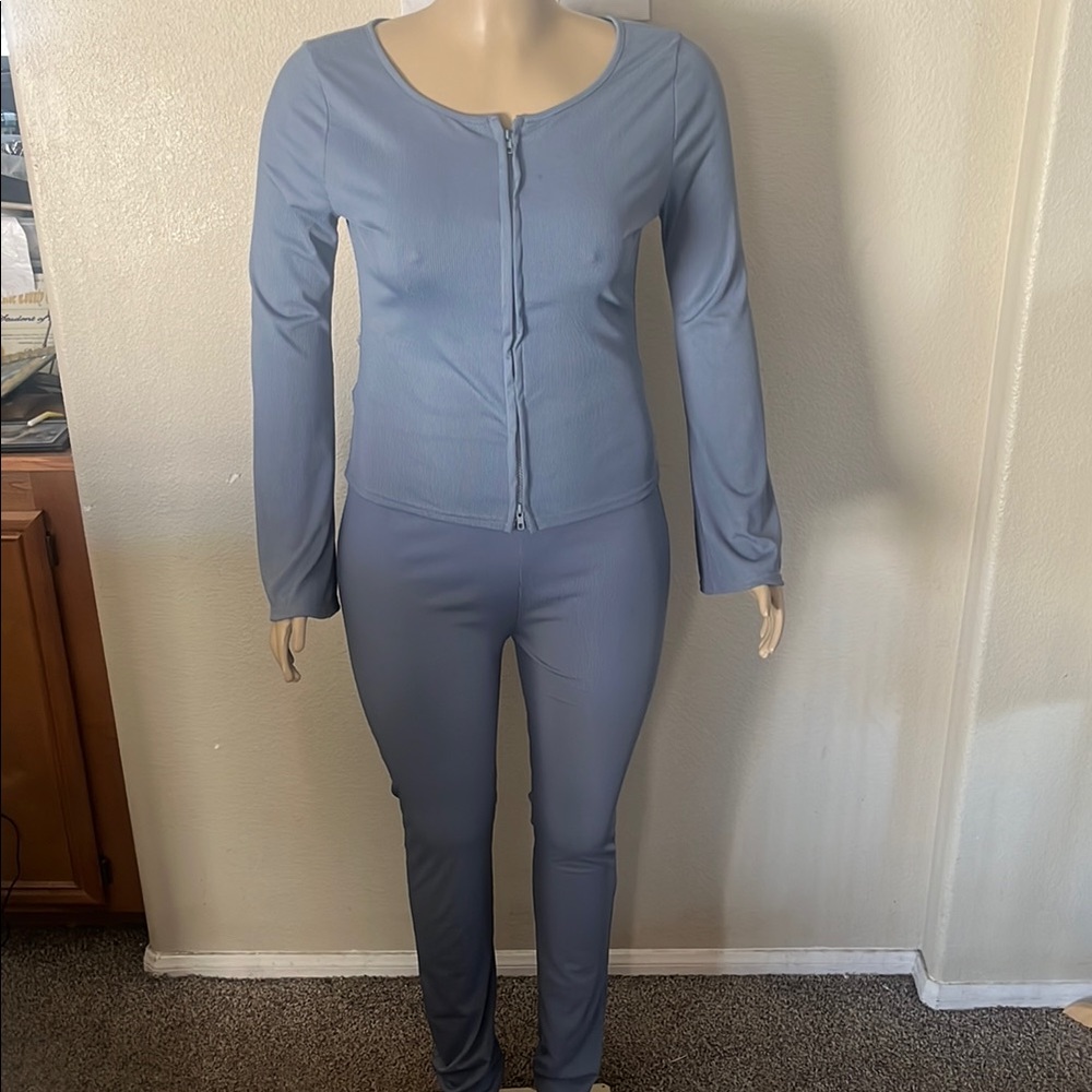 Blue Full-Length Jumpsuit with High Neck and Long Sleeves